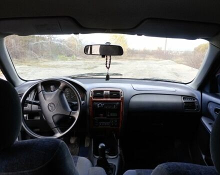 Серый Мазда 626, объемом двигателя 2 л и пробегом 333 тыс. км за 2500 $, фото 8 на Automoto.ua