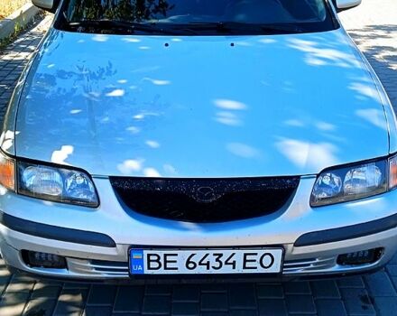 Серый Мазда 626, объемом двигателя 2 л и пробегом 285 тыс. км за 3100 $, фото 2 на Automoto.ua