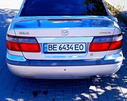 Серый Мазда 626, объемом двигателя 2 л и пробегом 285 тыс. км за 3100 $, фото 3 на Automoto.ua