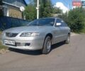 Серый Мазда 626, объемом двигателя 2 л и пробегом 300 тыс. км за 1350 $, фото 1 на Automoto.ua