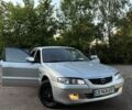 Серый Мазда 626, объемом двигателя 2 л и пробегом 395 тыс. км за 3000 $, фото 1 на Automoto.ua
