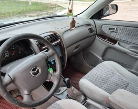 Серый Мазда 626, объемом двигателя 2 л и пробегом 230 тыс. км за 4500 $, фото 7 на Automoto.ua