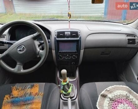 Серый Мазда 626, объемом двигателя 1.84 л и пробегом 312 тыс. км за 4500 $, фото 15 на Automoto.ua