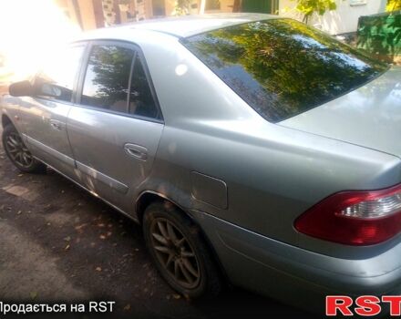 Серый Мазда 626, объемом двигателя 2 л и пробегом 301 тыс. км за 2750 $, фото 2 на Automoto.ua