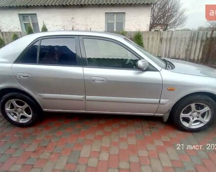 Серый Мазда 626, объемом двигателя 2 л и пробегом 341 тыс. км за 3500 $, фото 2 на Automoto.ua