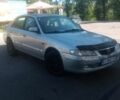 Серый Мазда 626, объемом двигателя 2 л и пробегом 300 тыс. км за 1566 $, фото 1 на Automoto.ua