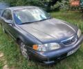 Сірий Мазда 626, об'ємом двигуна 2 л та пробігом 112 тис. км за 1509 $, фото 1 на Automoto.ua