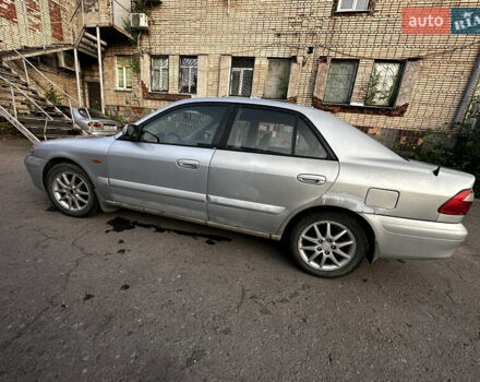 Серый Мазда 626, объемом двигателя 2 л и пробегом 310 тыс. км за 2300 $, фото 4 на Automoto.ua