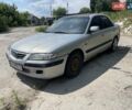 Сірий Мазда 626, об'ємом двигуна 1.8 л та пробігом 280 тис. км за 1000 $, фото 1 на Automoto.ua