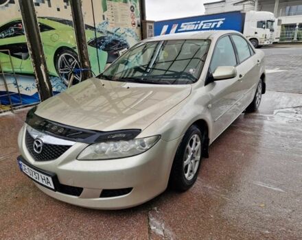 Серый Мазда 626, объемом двигателя 2 л и пробегом 221 тыс. км за 3400 $, фото 1 на Automoto.ua