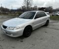 Серый Мазда 626, объемом двигателя 2 л и пробегом 300 тыс. км за 1500 $, фото 1 на Automoto.ua