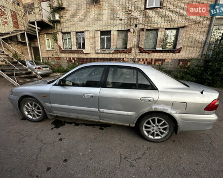 Серый Мазда 626, объемом двигателя 2 л и пробегом 310 тыс. км за 2300 $, фото 5 на Automoto.ua