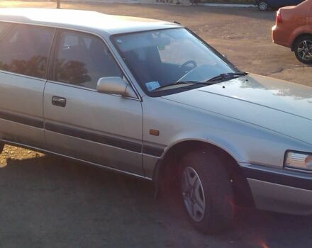 Серый Мазда 626, объемом двигателя 2 л и пробегом 400 тыс. км за 2300 $, фото 1 на Automoto.ua