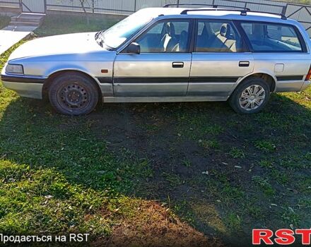 Серый Мазда 626, объемом двигателя 2 л и пробегом 318 тыс. км за 800 $, фото 1 на Automoto.ua