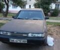 Серый Мазда 626, объемом двигателя 2 л и пробегом 400 тыс. км за 1005 $, фото 1 на Automoto.ua