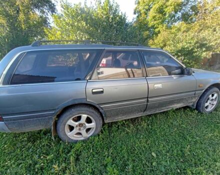 Серый Мазда 626, объемом двигателя 2 л и пробегом 100 тыс. км за 650 $, фото 2 на Automoto.ua