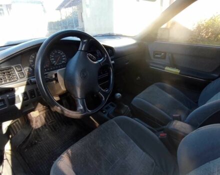 Серый Мазда 626, объемом двигателя 2 л и пробегом 100 тыс. км за 650 $, фото 4 на Automoto.ua