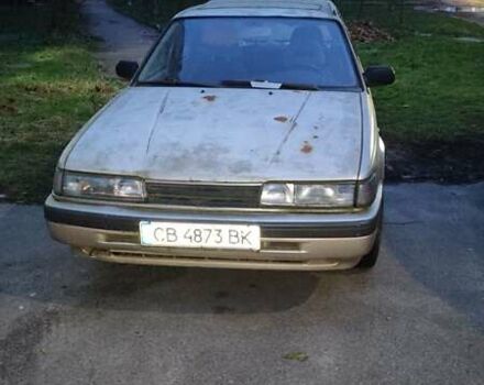 Сірий Мазда 626, об'ємом двигуна 2 л та пробігом 200 тис. км за 900 $, фото 1 на Automoto.ua