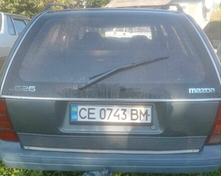Серый Мазда 626, объемом двигателя 2 л и пробегом 100 тыс. км за 650 $, фото 1 на Automoto.ua