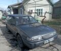 Серый Мазда 626, объемом двигателя 2.2 л и пробегом 389 тыс. км за 1700 $, фото 1 на Automoto.ua