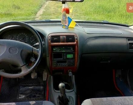 Серый Мазда 626, объемом двигателя 2 л и пробегом 270 тыс. км за 2700 $, фото 8 на Automoto.ua