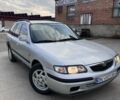 Серый Мазда 626, объемом двигателя 1.8 л и пробегом 250 тыс. км за 2207 $, фото 1 на Automoto.ua