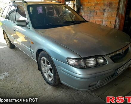 Серый Мазда 626, объемом двигателя 2 л и пробегом 200 тыс. км за 2500 $, фото 1 на Automoto.ua