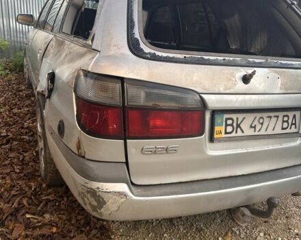 Серый Мазда 626, объемом двигателя 1.8 л и пробегом 200 тыс. км за 600 $, фото 1 на Automoto.ua