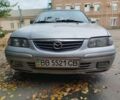 Серый Мазда 626, объемом двигателя 2 л и пробегом 1 тыс. км за 785 $, фото 1 на Automoto.ua