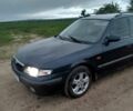 Серый Мазда 626, объемом двигателя 0 л и пробегом 320 тыс. км за 1100 $, фото 5 на Automoto.ua