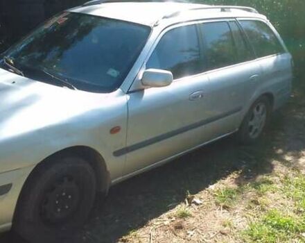 Серый Мазда 626, объемом двигателя 2 л и пробегом 250 тыс. км за 1800 $, фото 2 на Automoto.ua