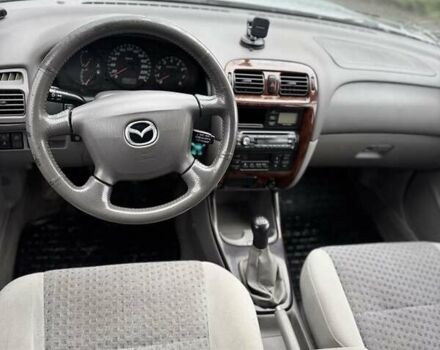 Серый Мазда 626, объемом двигателя 2 л и пробегом 220 тыс. км за 1700 $, фото 6 на Automoto.ua