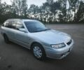 Серый Мазда 626, объемом двигателя 2 л и пробегом 430 тыс. км за 2650 $, фото 1 на Automoto.ua