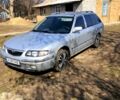 Серый Мазда 626, объемом двигателя 1.8 л и пробегом 250 тыс. км за 3000 $, фото 2 на Automoto.ua
