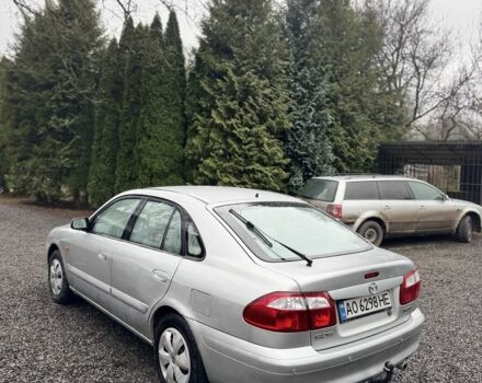 Серый Мазда 626, объемом двигателя 2 л и пробегом 220 тыс. км за 1700 $, фото 2 на Automoto.ua