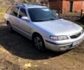 Серый Мазда 626, объемом двигателя 1.8 л и пробегом 250 тыс. км за 3000 $, фото 1 на Automoto.ua