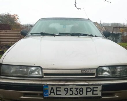 Серый Мазда 626, объемом двигателя 2 л и пробегом 500 тыс. км за 800 $, фото 1 на Automoto.ua