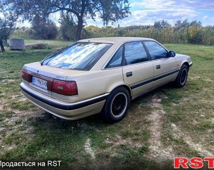 Серый Мазда 626, объемом двигателя 2 л и пробегом 370 тыс. км за 1950 $, фото 5 на Automoto.ua