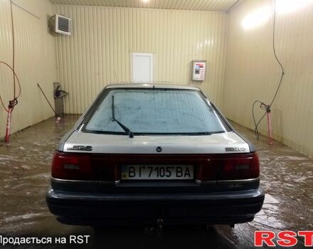 Серый Мазда 626, объемом двигателя 2.2 л и пробегом 670 тыс. км за 1000 $, фото 7 на Automoto.ua