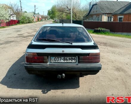 Серый Мазда 626, объемом двигателя 20 л и пробегом 345 тыс. км за 1300 $, фото 5 на Automoto.ua