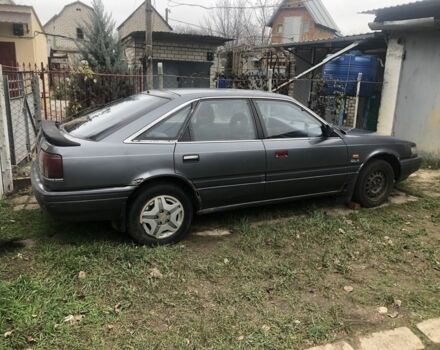 Сірий Мазда 626, об'ємом двигуна 2.2 л та пробігом 450 тис. км за 997 $, фото 3 на Automoto.ua