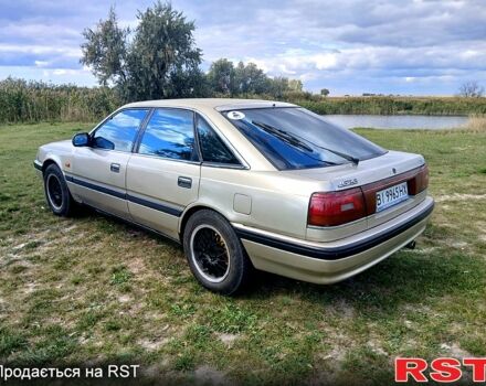 Серый Мазда 626, объемом двигателя 2 л и пробегом 370 тыс. км за 1950 $, фото 10 на Automoto.ua