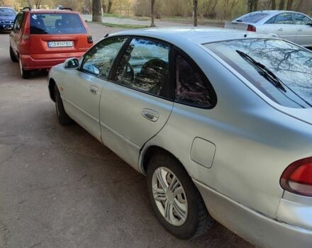 Серый Мазда 626, объемом двигателя 2 л и пробегом 347 тыс. км за 1100 $, фото 3 на Automoto.ua