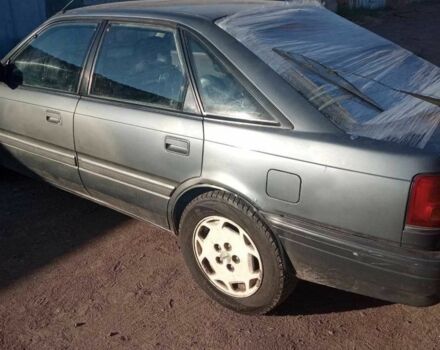 Серый Мазда 626, объемом двигателя 2 л и пробегом 400 тыс. км за 716 $, фото 3 на Automoto.ua