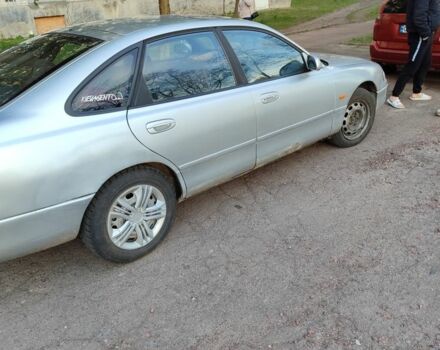 Серый Мазда 626, объемом двигателя 2 л и пробегом 347 тыс. км за 1100 $, фото 2 на Automoto.ua