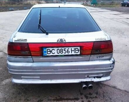 Серый Мазда 626, объемом двигателя 2 л и пробегом 300 тыс. км за 400 $, фото 3 на Automoto.ua