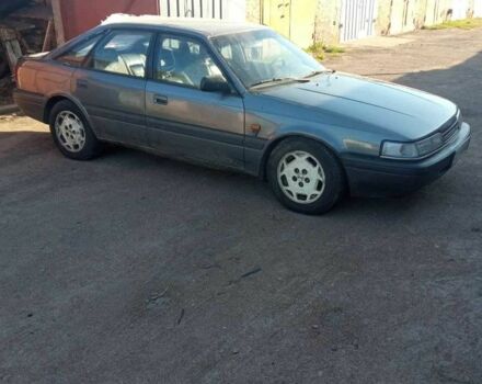 Серый Мазда 626, объемом двигателя 2 л и пробегом 400 тыс. км за 716 $, фото 1 на Automoto.ua