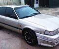 Серый Мазда 626, объемом двигателя 2 л и пробегом 300 тыс. км за 400 $, фото 1 на Automoto.ua