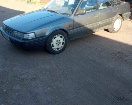 Серый Мазда 626, объемом двигателя 2 л и пробегом 400 тыс. км за 716 $, фото 4 на Automoto.ua