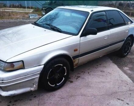 Серый Мазда 626, объемом двигателя 2 л и пробегом 300 тыс. км за 400 $, фото 2 на Automoto.ua